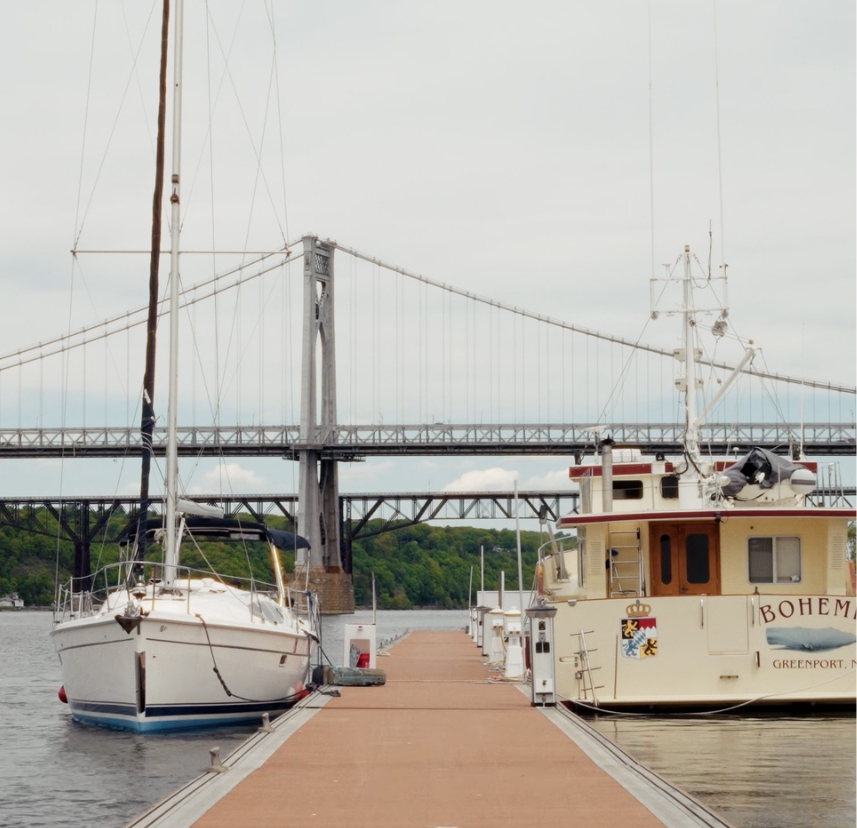 Sailboats docked at Shadows Marina near the Mid-Hudson Bridge
