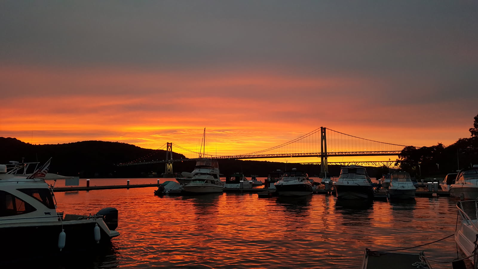 Sunset Over Shadows Marina and Mid-Hudson Bridge Sunset over Shadows Marina with the Mid-Hudson Bridge in the distance