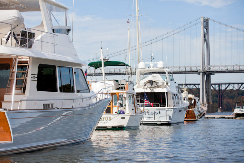 Boats in Slips at Shadows Marina in Poughkeepsie NY Boats docked in slips at Shadows Marina in Poughkeepsie NY near the Mid-Hudson Bridge