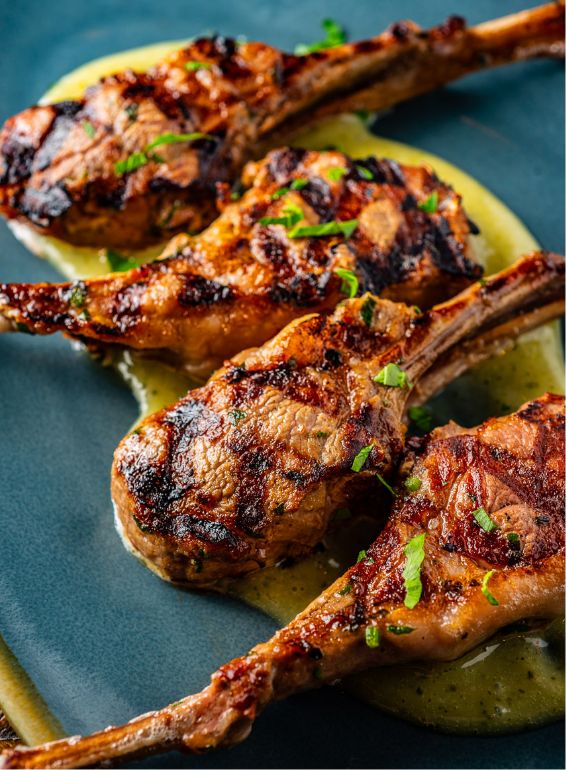 Grilled Lamb Lollipops at Shadows on the Hudson Grilled entree served at Shadows on the Hudson near Shadows Marina